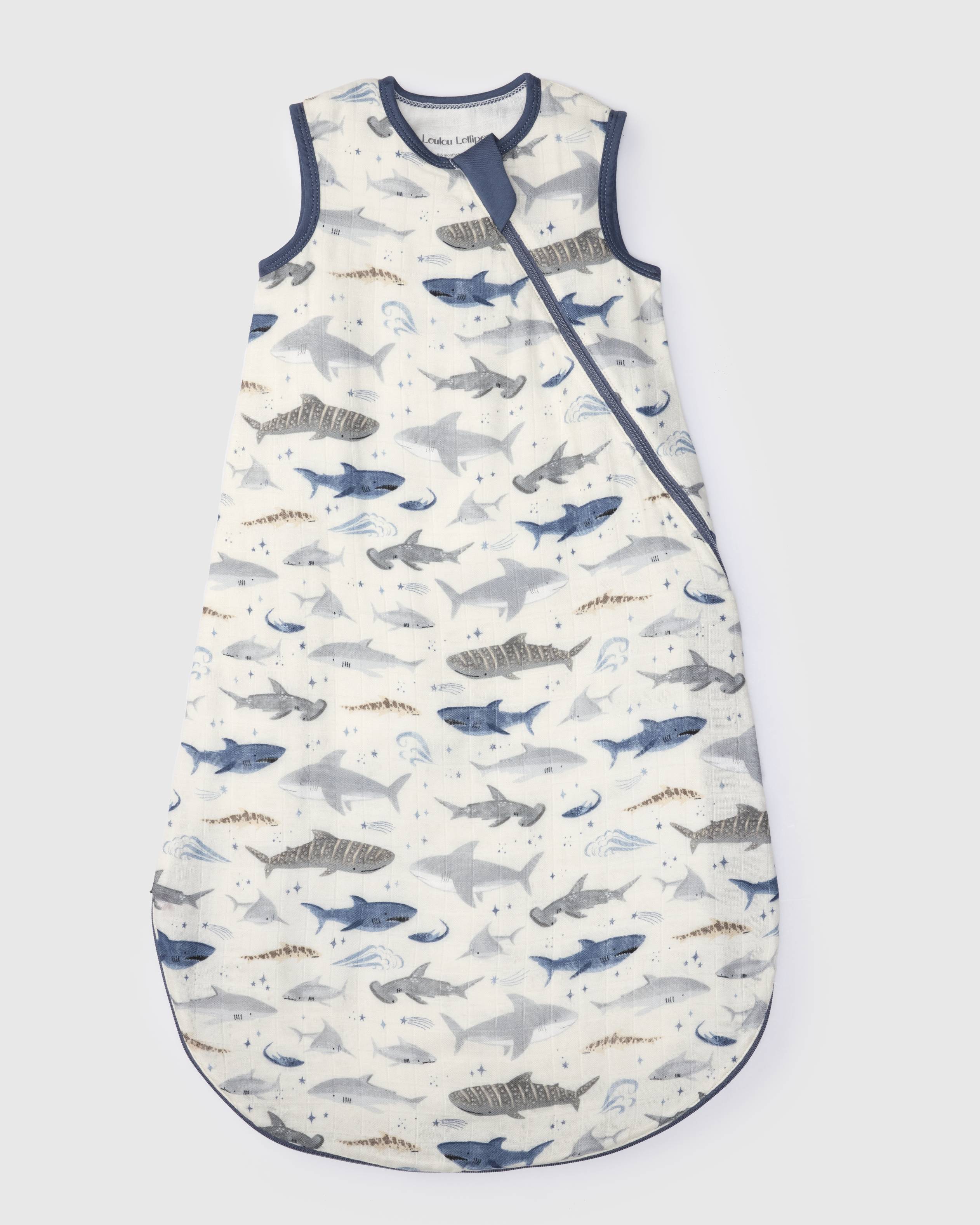 Loulou Lollipop bamboo muslin baby sleep sack 0.5 TOG in Smiley Sharks — front view on white background