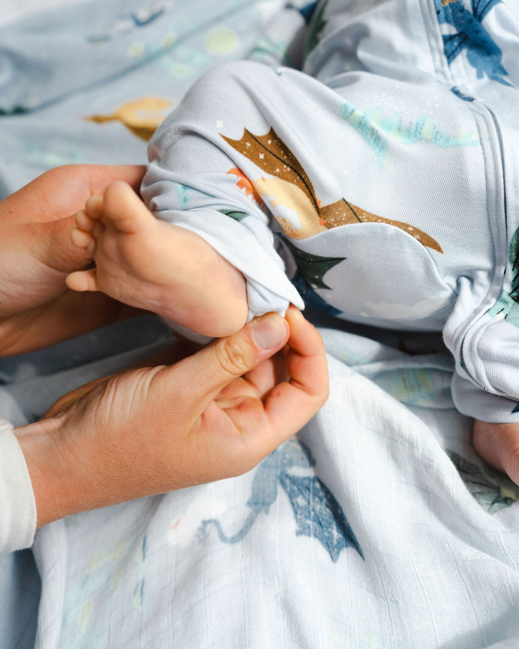 Baby Sleeper in TENCEL Lyocell showing fold over foot cuff in Magical Dragons print.