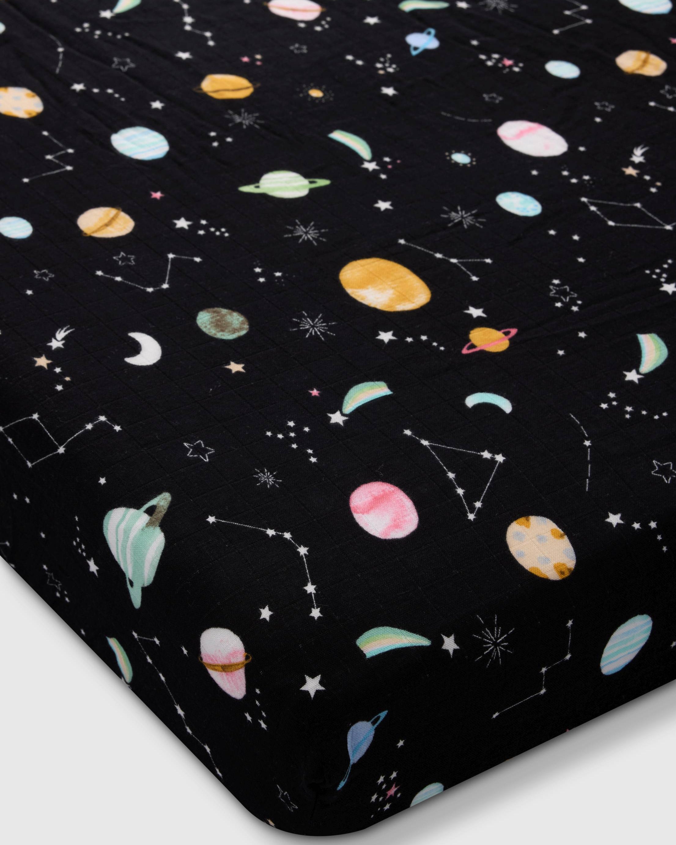 Loulou Lollipop muslin fitted crib sheet in Planets for US standard crib — front view on white background