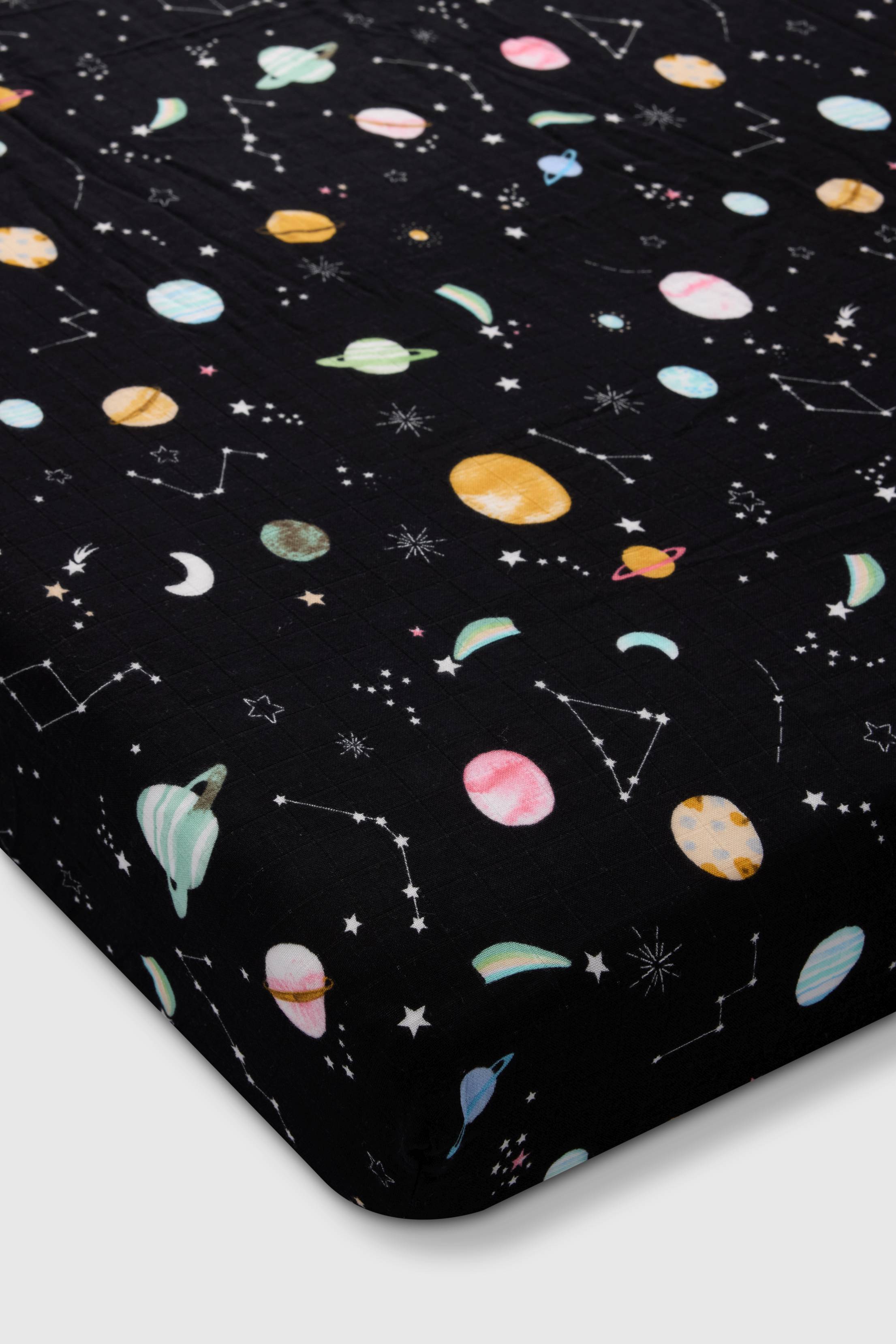 Loulou Lollipop muslin fitted crib sheet in Planets for US standard crib — front view on white background