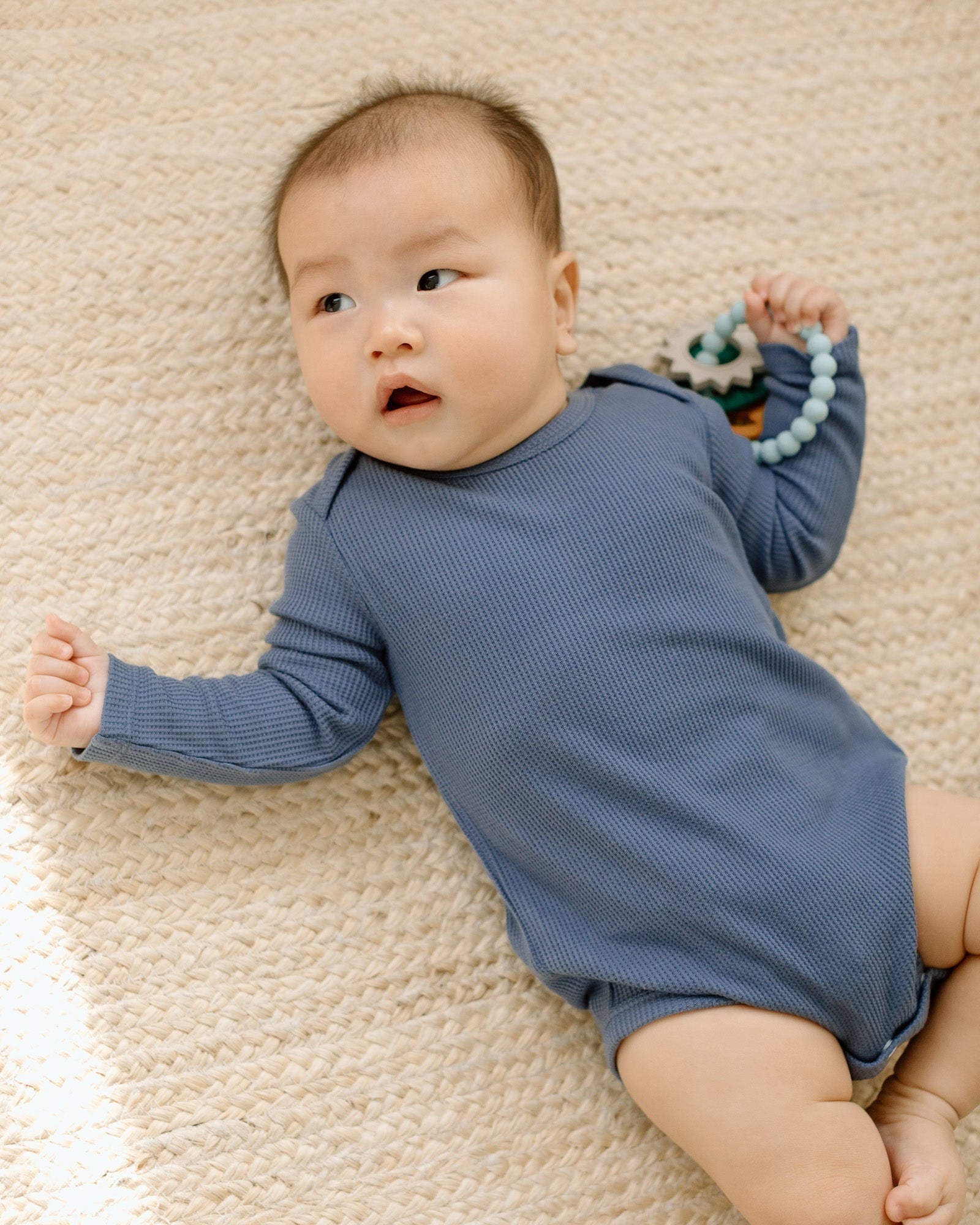 Loulou Lollipop Waffle Long Sleeve Bodysuit in Denim Blue — front view on white background
