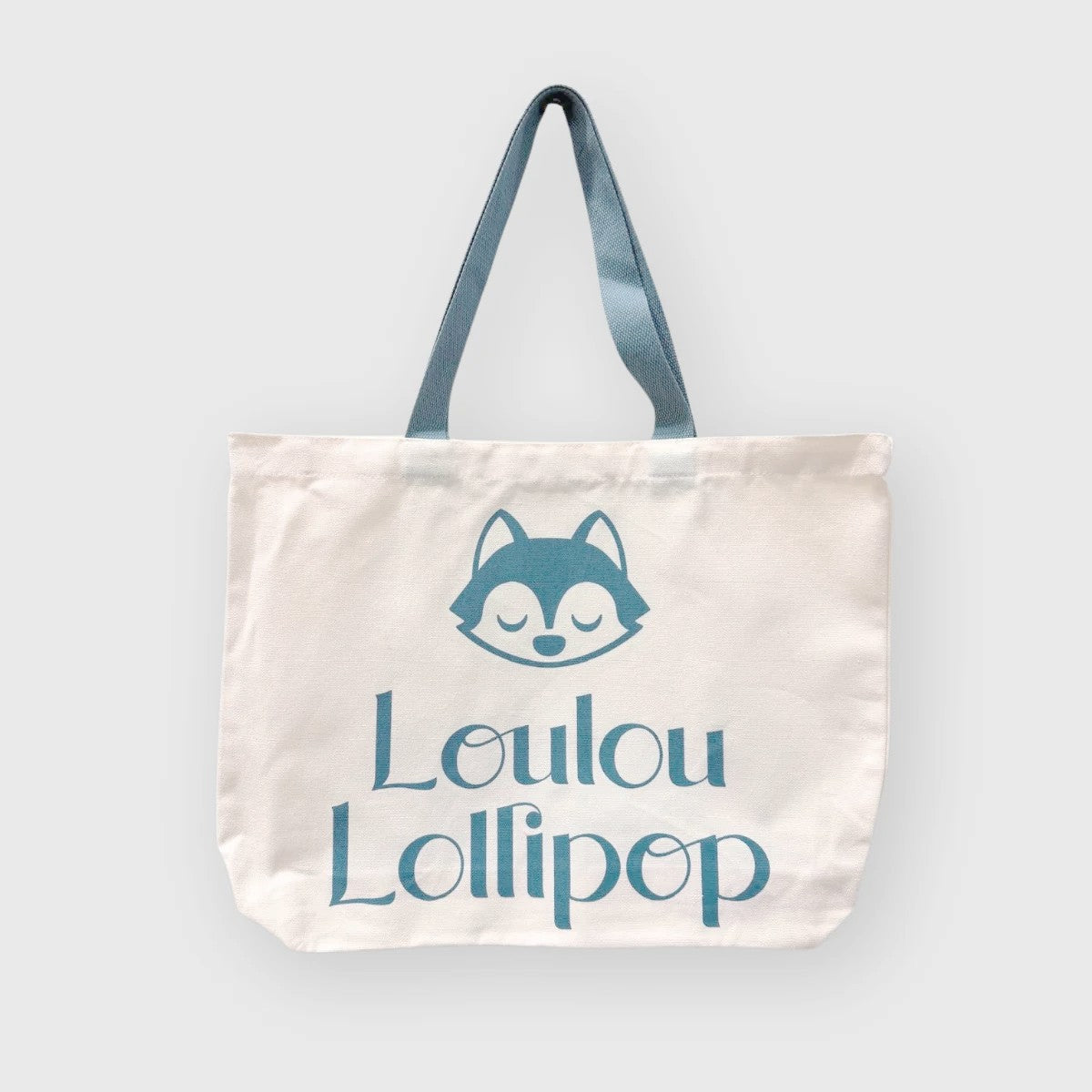 Loulou Lollipop Wolfie Logo Canvas Tote in Wolfie Logo Canvas Tote — front view on white background