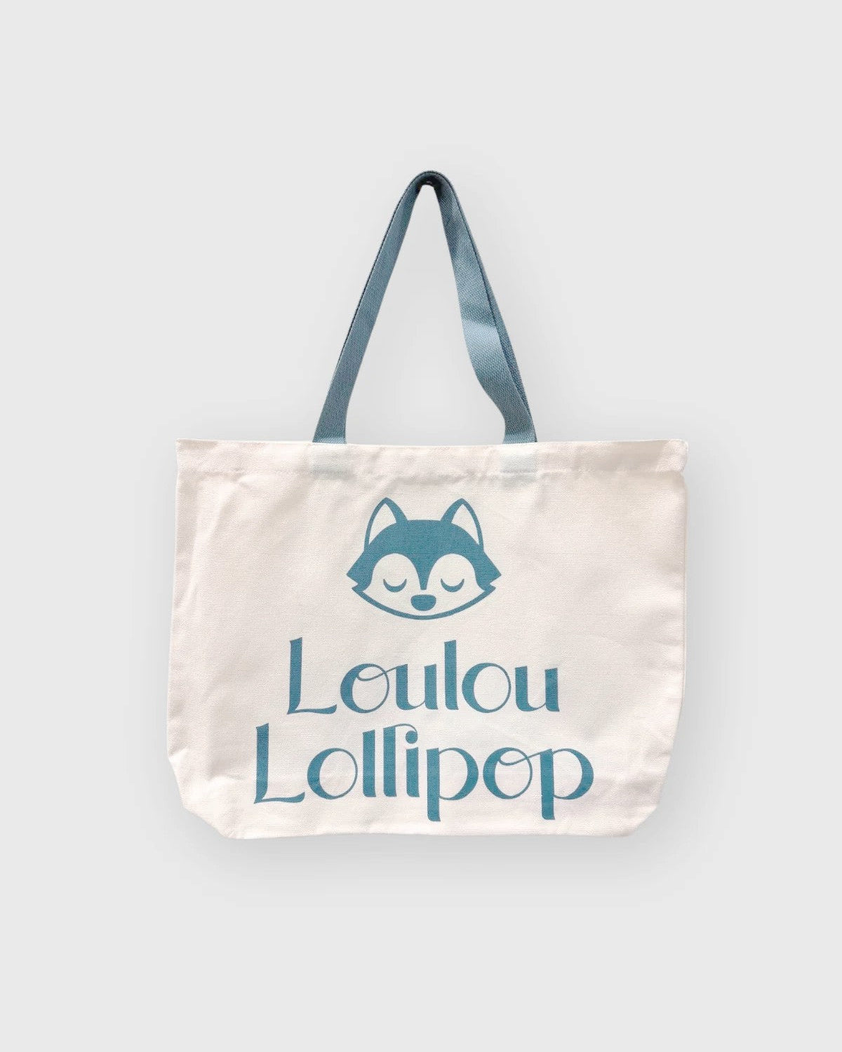 Loulou Lollipop Wolfie Logo Canvas Tote in Wolfie Logo Canvas Tote — front view on white background