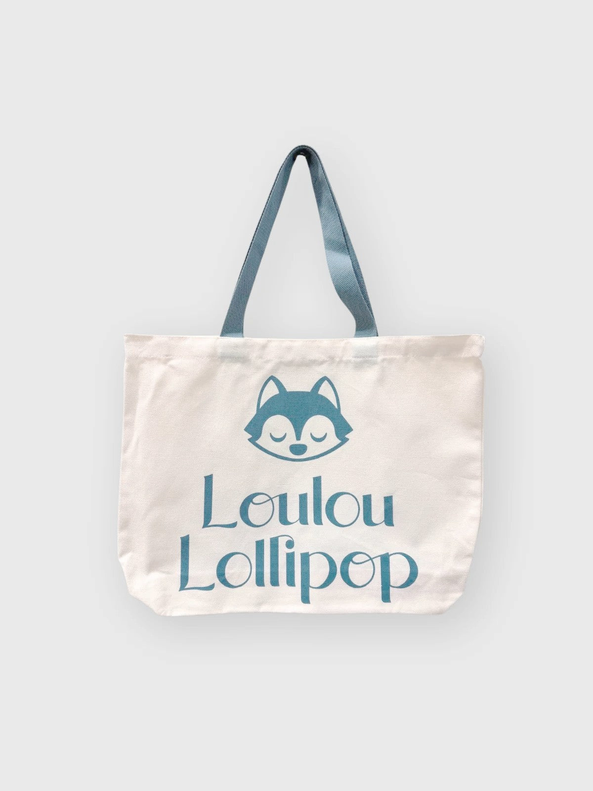 Loulou Lollipop Wolfie Logo Canvas Tote in Wolfie Logo Canvas Tote — front view on white background