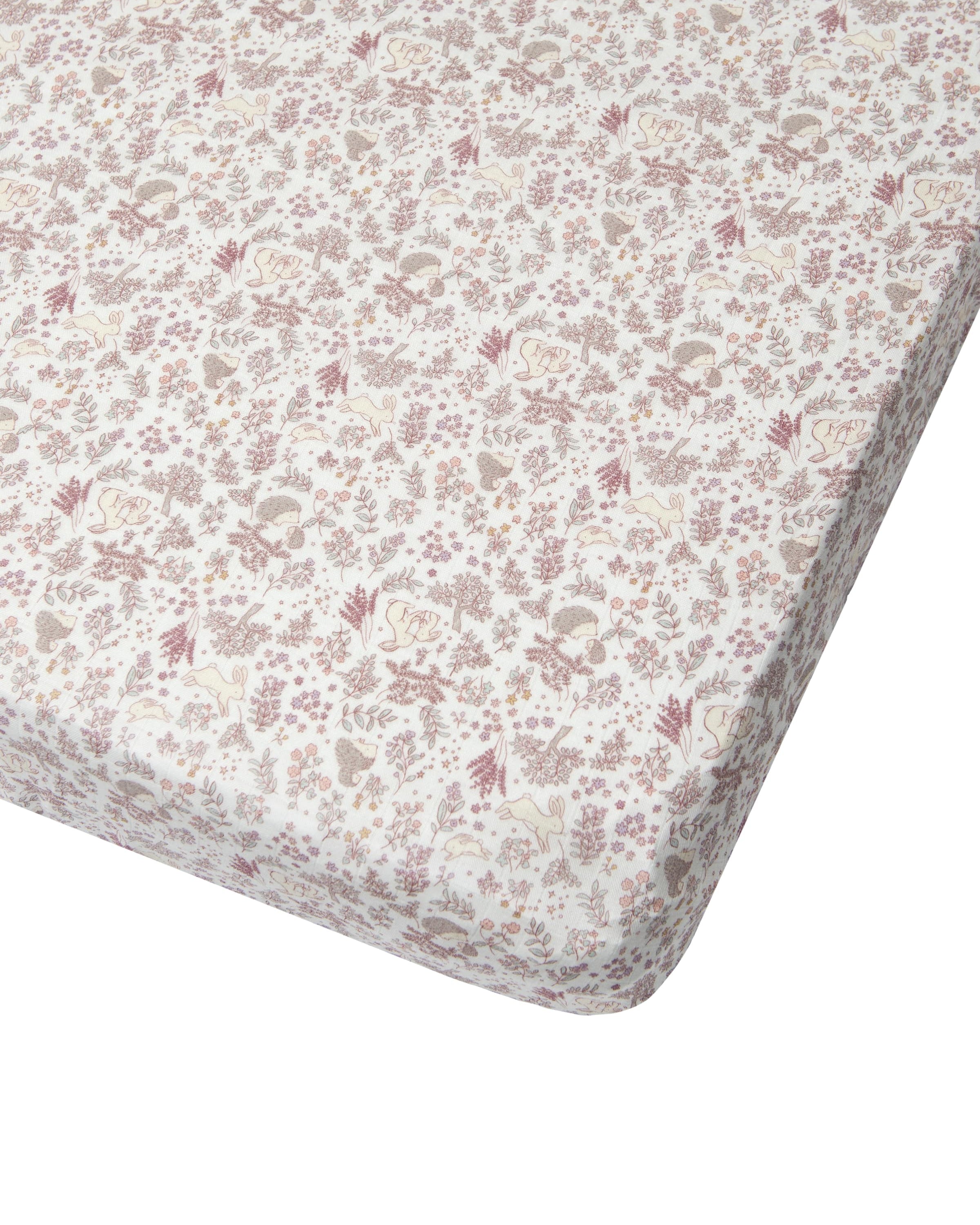 Loulou Lollipop muslin fitted crib sheet in Hedgehog Forest for US standard crib — front view on white background