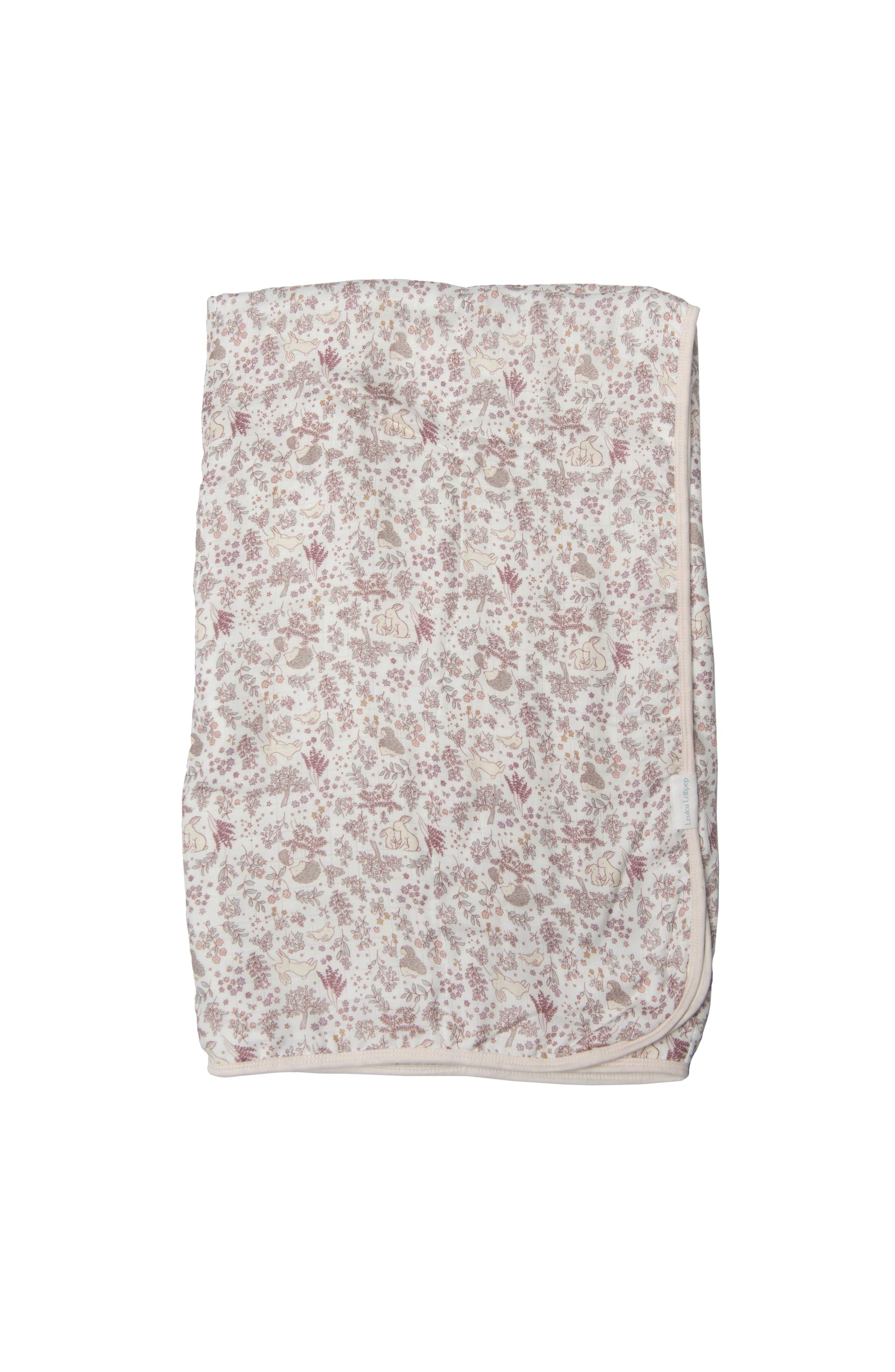 Loulou Lollipop muslin baby quilt blanket in Hedgehog Forest — front view on white background