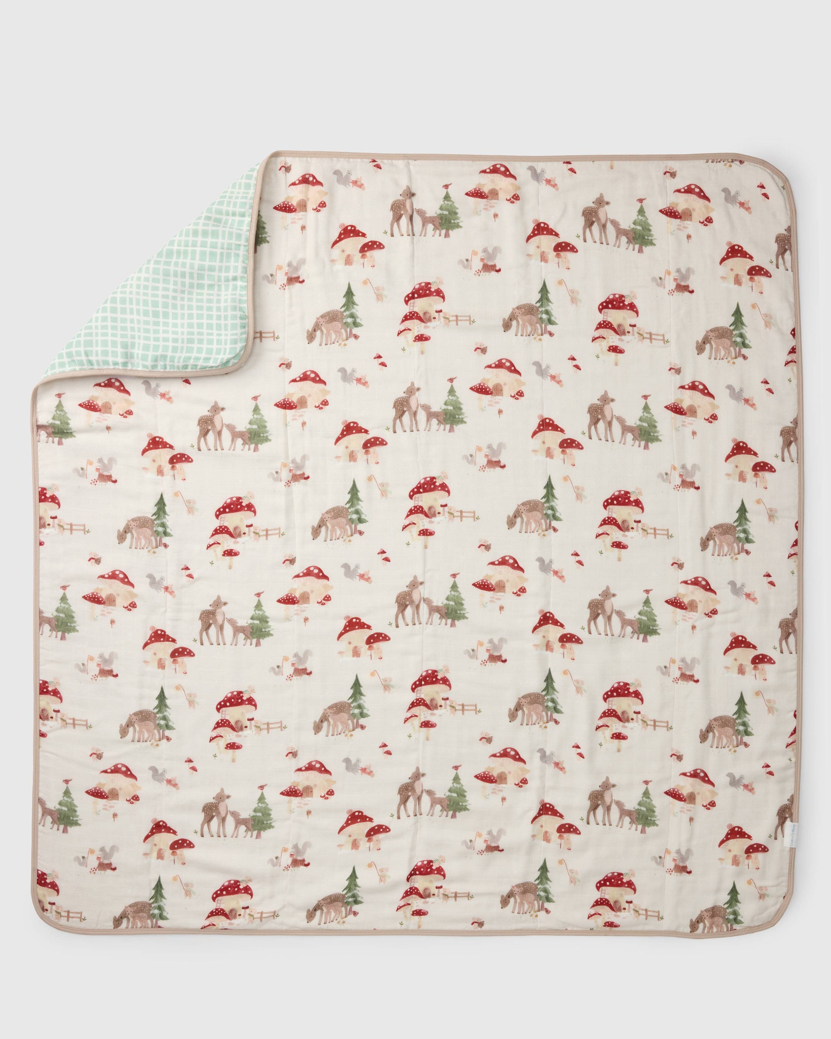 Loulou Lollipop muslin baby quilt blanket in Forest Families — front view on white background