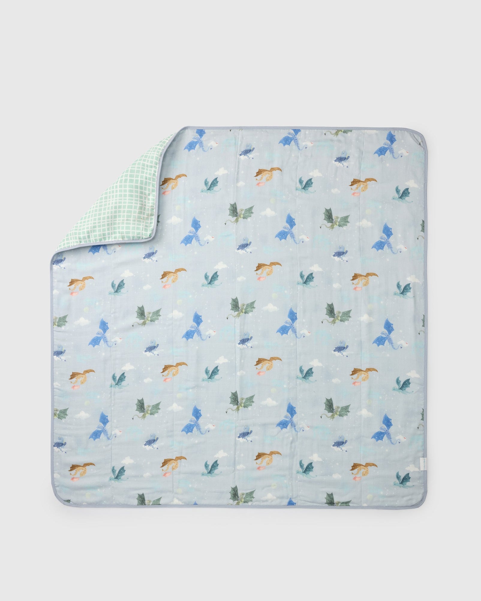 Loulou Lollipop muslin baby quilt blanket in Magical Dragons — front view on white background