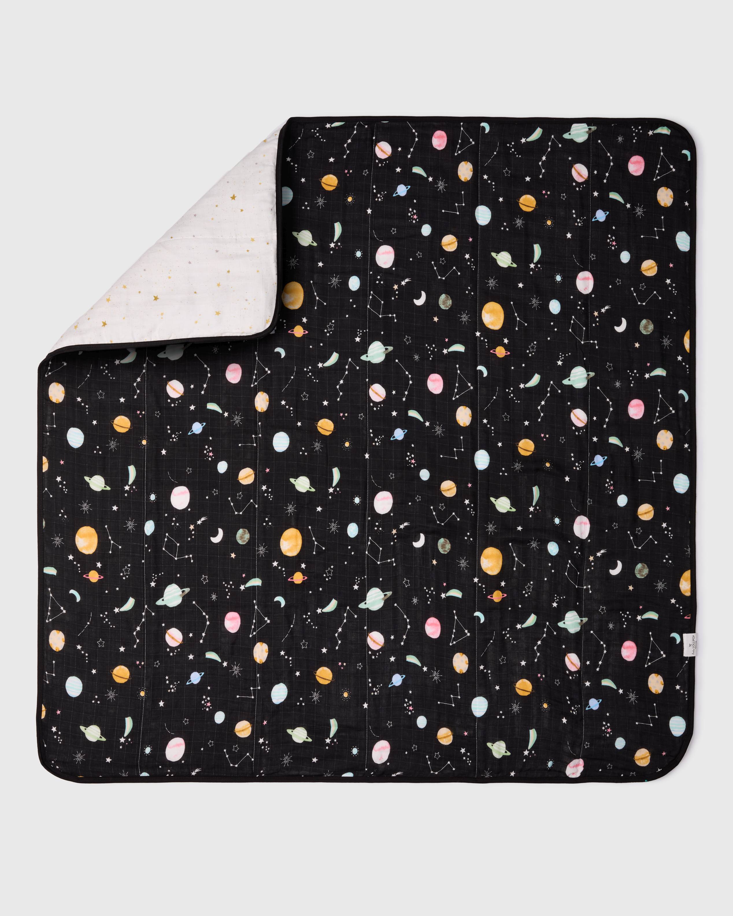 Loulou Lollipop muslin baby quilt blanket in Planets — front view on white background