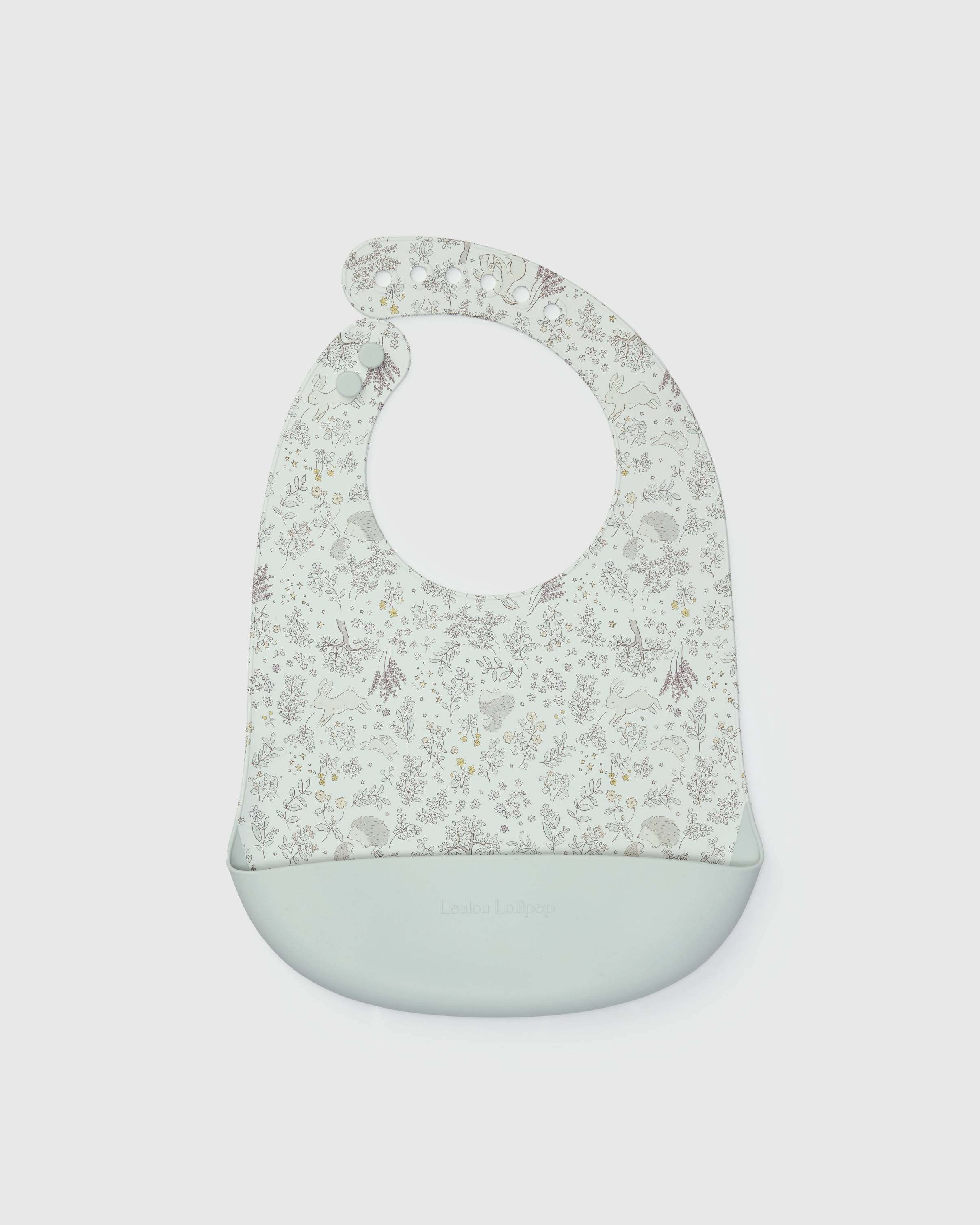 Loulou Lollipop FDA-compliant food-grade silicone baby bib in Hedgehog Forest — front view on white background