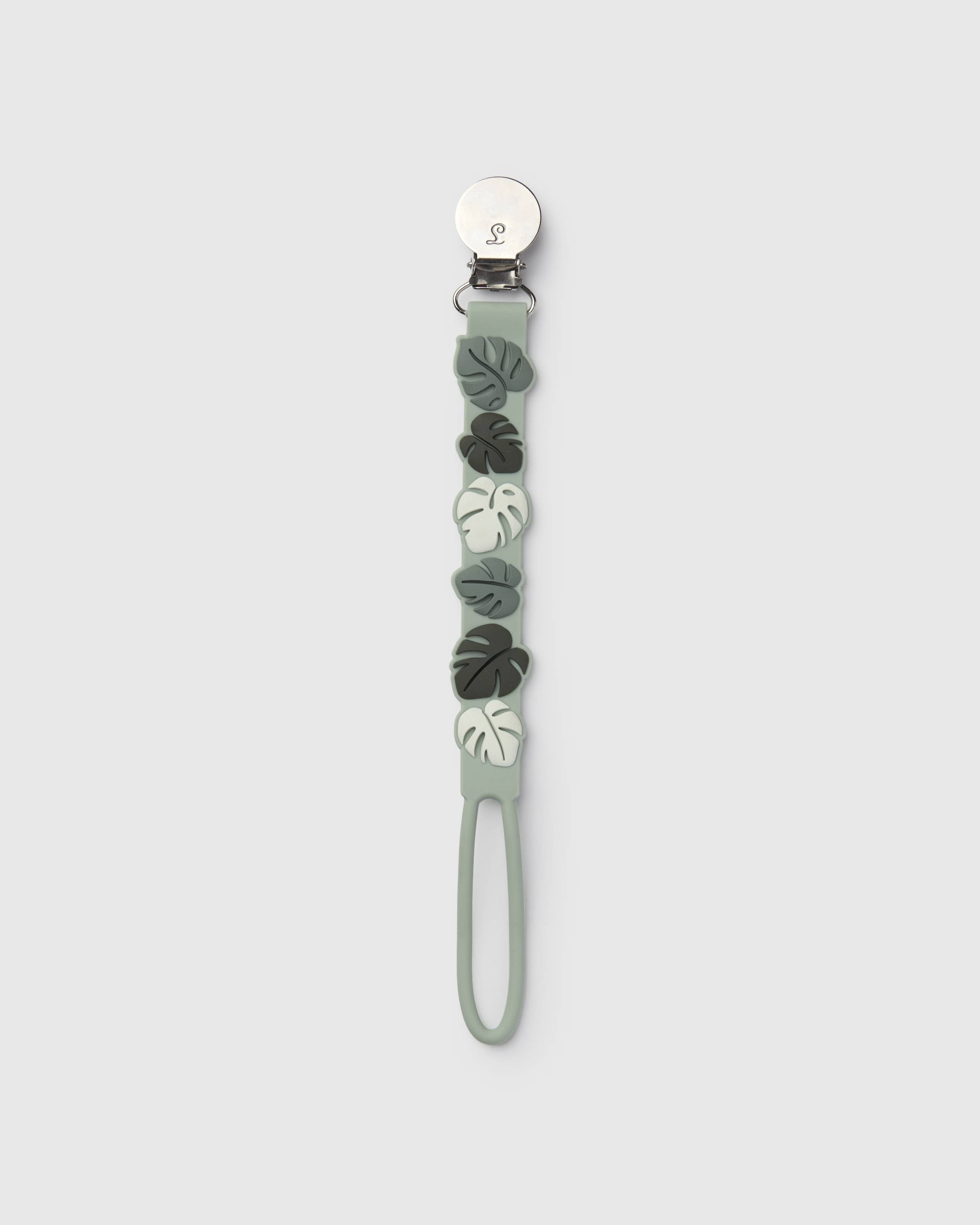 Loulou Lollipop Pacifier Clip in Monstera — front view on white background