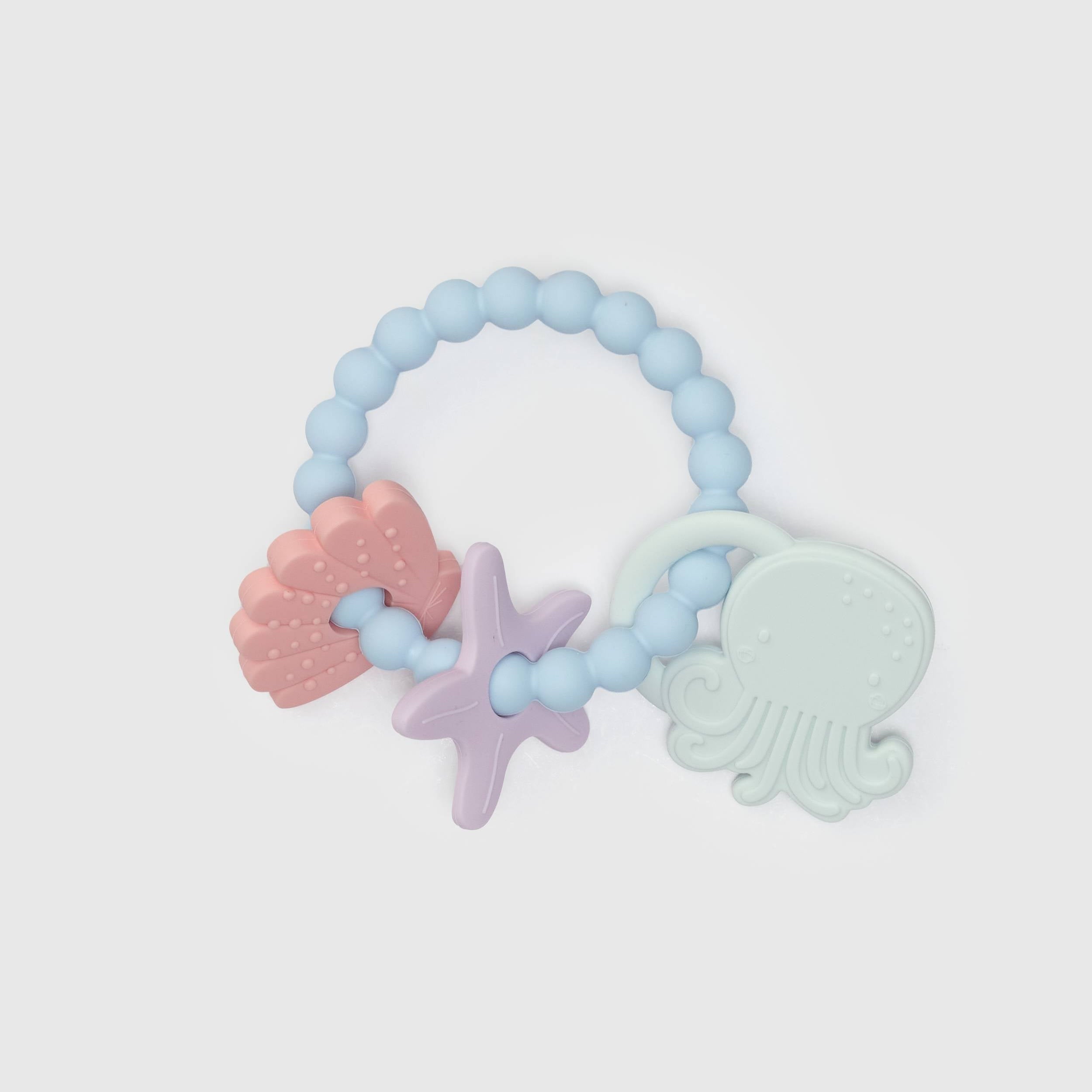 Loulou Lollipop Teething Charms in Skylar Shell — front view on white background