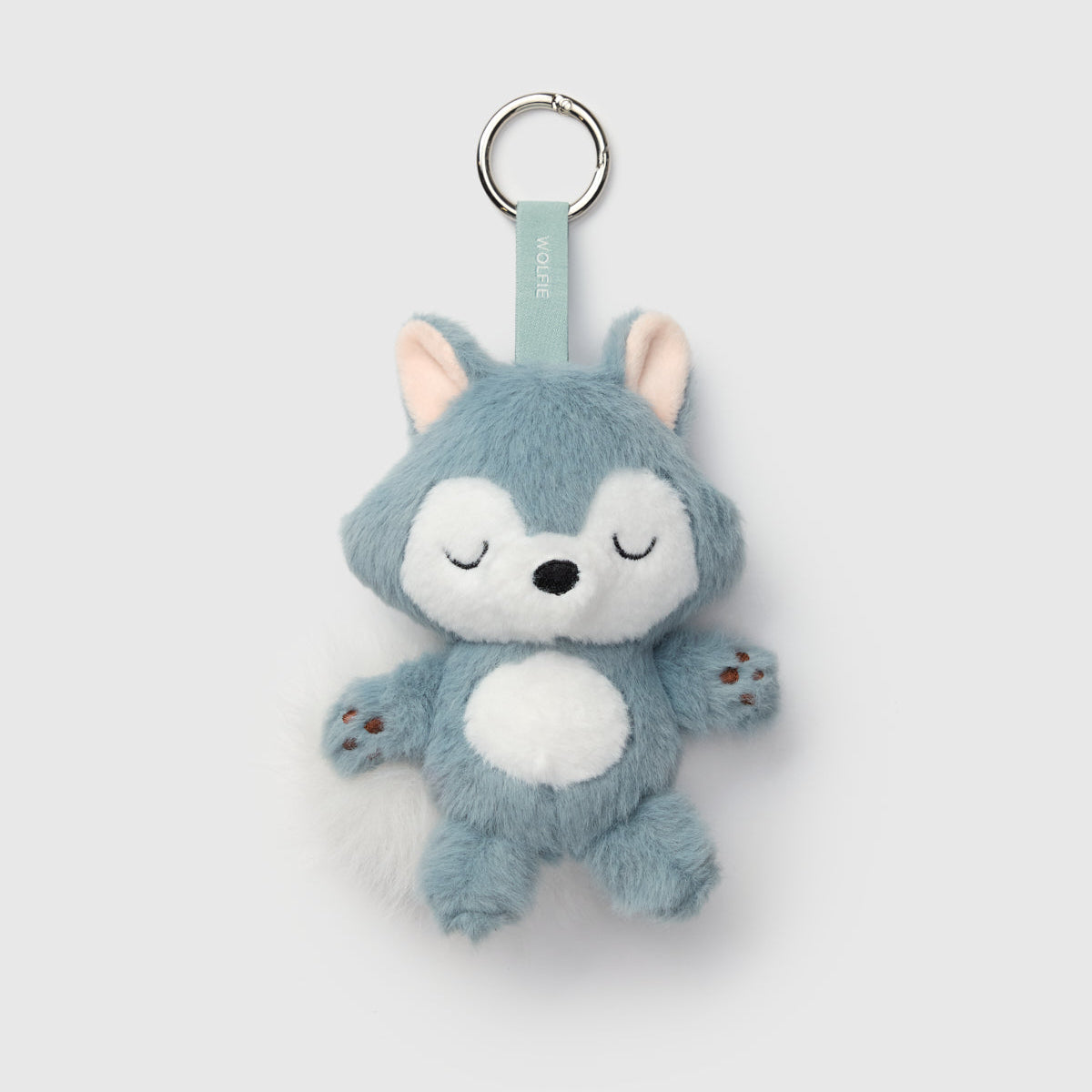 Loulou Lollipop Wolfie Plush Bag Charm in Smoke Blue — front view on white background