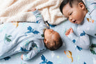 Baby in Sleep Sack with Big Brother in Sleeper in Magical Dragons print.
