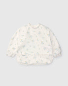 Loulou Lollipop Long Sleeve Bib in Ditsy Floral — front view on white background