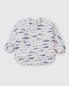 Loulou Lollipop Long Sleeve Bib in Smiley Sharks — front view on white background