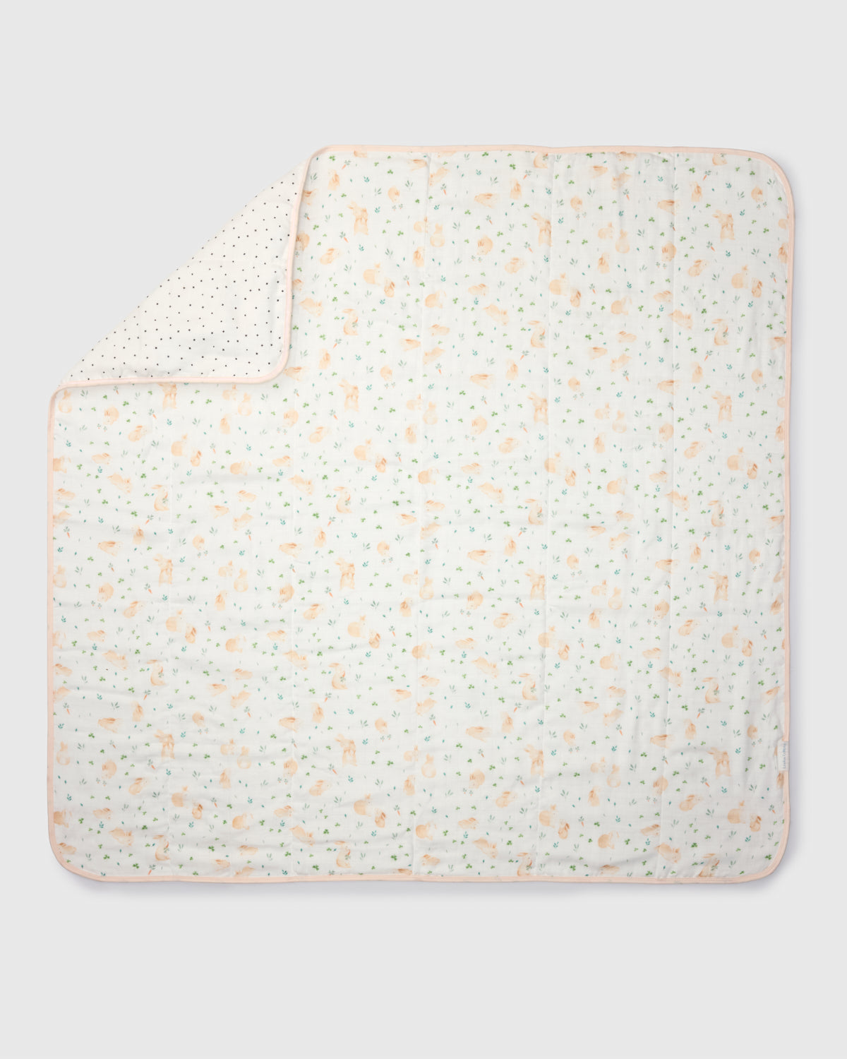 Loulou Lollipop muslin baby quilt blanket in Bunny Meadow — front view on white background