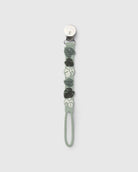 Loulou Lollipop Pacifier Clip in Monstera — front view on white background